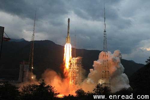 long march 3c rocket carrying china's second unmanned lunar probe, chang'e-2, lifts off from the launch pad at the xichang satellite launch center in southwest china's sichuan province, at 18:59:57