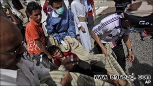 protesters carried the injured to safety using makeshift stretchers