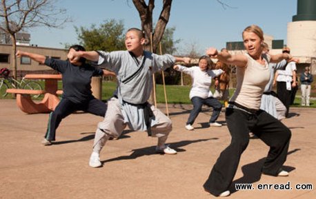 lisa becker, a biology research assistant, learns shaolin kung fu from the masters in the class at stanford.