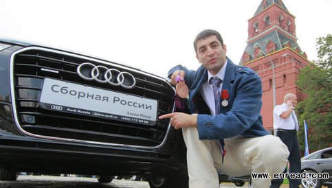 russian tv showed the cars lined up near the kremlin on wednesday: an audi a8 for each gold medalist, for silver an audi a7 and for bronze an audi a6.